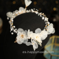 Elegantes accesorios para el cabello nupcial diadema de flores blancas